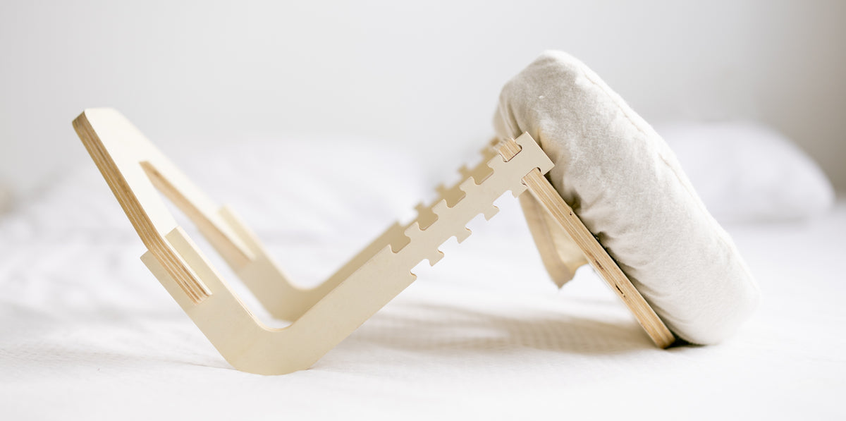 Le Set de massage Ezspa installé sur un lit fait